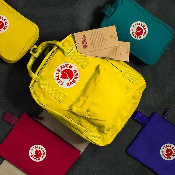 Компактний рюкзак-трансформер Fjallraven Kanken Mini 7л (27х21х10 см) – Жовтий